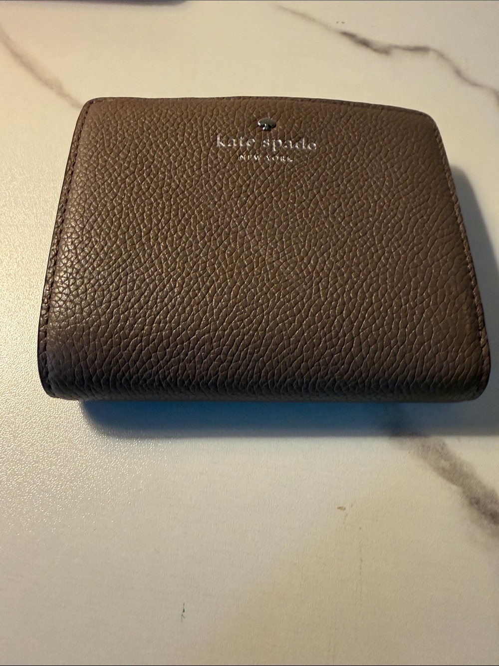 kate spade Pebbled Leather Wallet in Brown